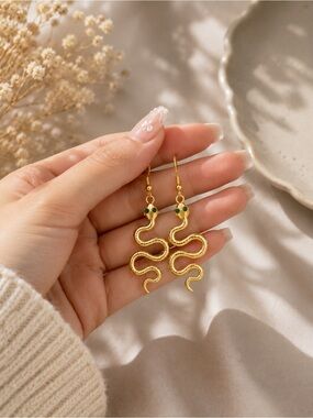 Gold Snake Drop Earrings with Green Accents